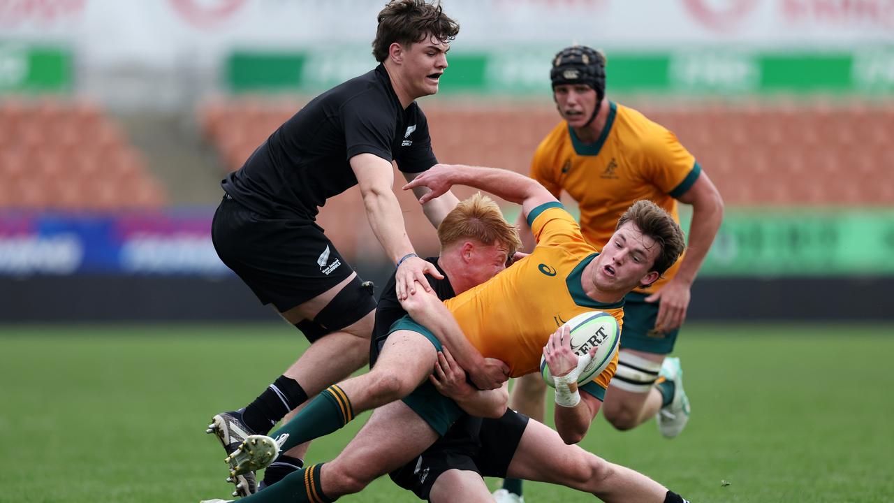 Angus Grover playing for Australia in New Zealand.