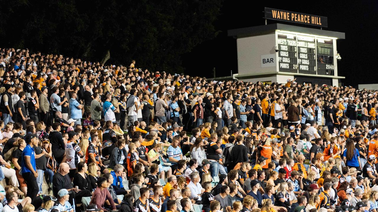 Thousands of football fans flock to Leichhardt Oval to watch the West Tigers play to Cronulla Sharks. No-one depicted is accused of any wrongdoing. Photo: Tom Parrish