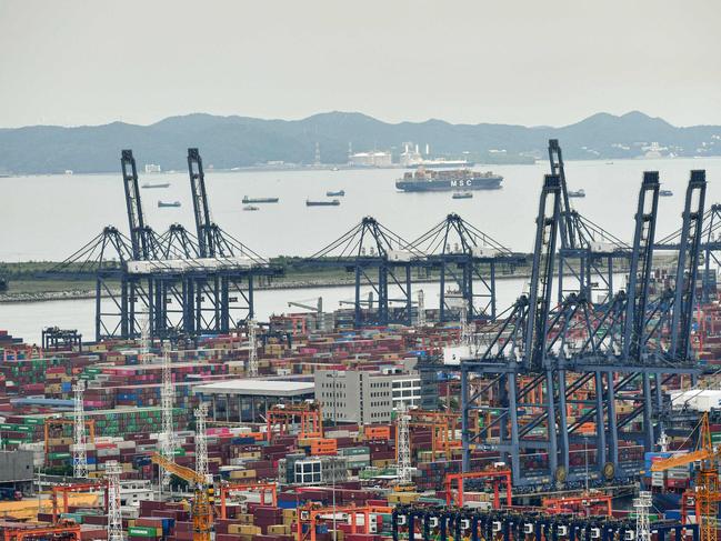 CORRECTION / This aerial photo taken on June 22, 2021 shows a view of Yantian port in Shenzhen in China's southern Guangdong province. - A backlog at Yantian port - China's largest container terminal - caused by a Covid-19 outbreak among port workers will take several weeks to clear, the world's biggest shipping firm said on June 21. (Photo by STR / AFP) / China OUT / âThe erroneous mention[s] appearing in the metadata of this photo by STR has been modified in AFP systems in the following manner: [June 22] instead of [June 21]. Please immediately remove the erroneous mention[s] from all your online services and delete it (them) from your servers. If you have been authorized by AFP to distribute it (them) to third parties, please ensure that the same actions are carried out by them. Failure to promptly comply with these instructions will entail liability on your part for any continued or post notification usage. Therefore we thank you very much for all your attention and prompt action. We are sorry for the inconvenience this notification may cause and remain at your disposal for any further information you may require.â