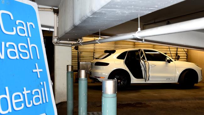 The stolen Porsche has been dumped in a car wash carpark at The Glen. Picture: Nicole Garmston