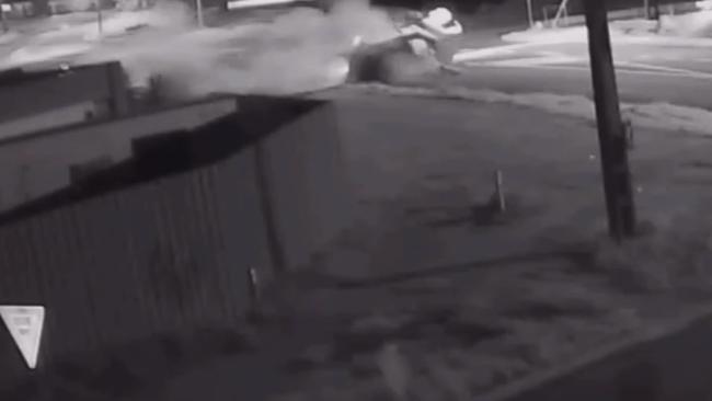 Security camera footage captures the moment an allegedly stolen truck crashed and rolled on Brown Street, Alice Springs