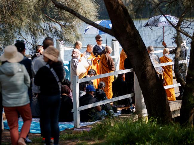 A Buddhist ceremony takes place at Shearer Park in Lansvale after police recovered the bodies of Ms Doan and her children. Picture: NewsWire/Nikki Short