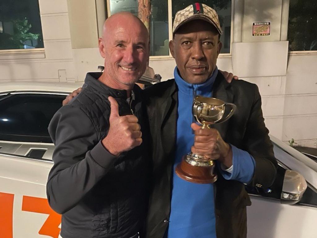 Melbourne Cup winning jockey Glen Boss left his prized Cups in the back of a 13cabs taxi, which were returned by driver Gedy Hildid. Picture: 13cabs