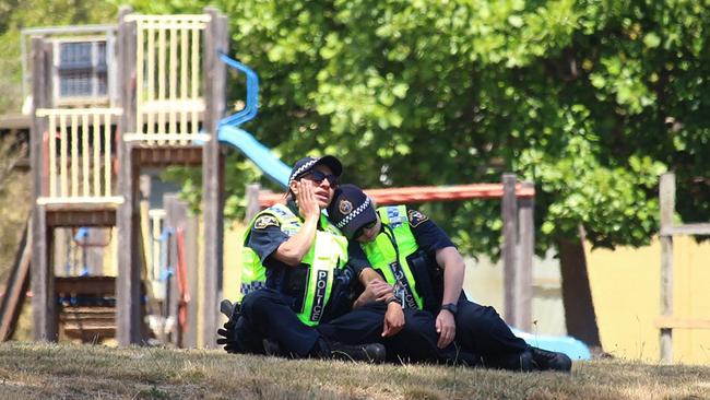 Devastated police officers at the scene of the jumping castle tragedy at Hillcrest Primary School in Devonport, on December 16, 2021. PICTURE: Monte Bovill, ABC News