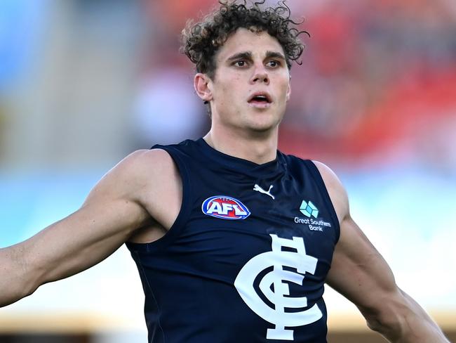 GOLD COAST, AUSTRALIA - AUGUST 19: Charlie Curnow of the Blues celebrates kicking a goal during the round 23 AFL match between Gold Coast Suns and Carlton Blues at Heritage Bank Stadium, on August 19, 2023, in Gold Coast, Australia. (Photo by Albert Perez/AFL Photos via Getty Images)