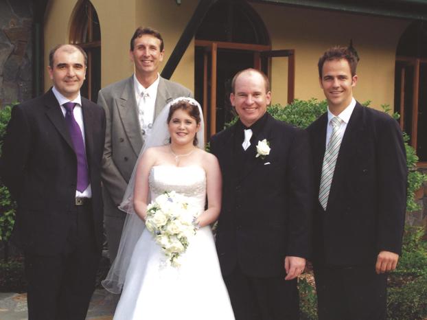 Lucinda Winnem on her wedding day to Damon Simpson with from left Dr John Dunning, Dr Keith McNeil and Dr Peter Hopkins.