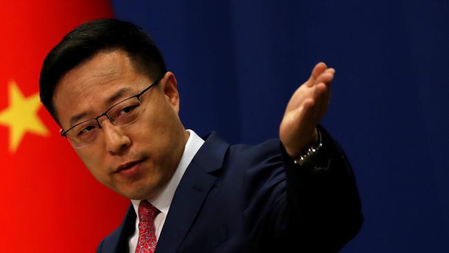 Chinese Foreign Ministry spokesman Zhao Lijian speaks to reporters. Picture: Reuters.