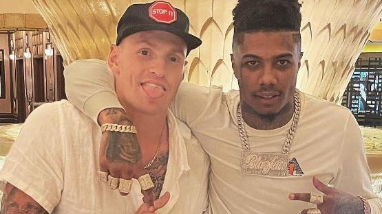 Former Brisbane Lions star with Rapper Blueface. Mitch Robinson documents his trip to the United States with his ex-teammates in October. Source: Mitch Robinson