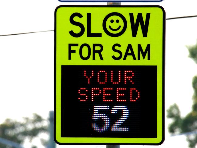 Cars driving past Slow for Sam sign on Dornoch Terrace at Highgate Hill, Highgate Hill Monday 11th November 2019 Picture AAP/David Clark