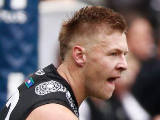 Jordan De Goey of the Magpies celebrates a goal during the Round 11 AFL match between the Collingwood Magpies and the Fremantle Dockers at the MCG in Melbourne, Saturday, June 1, 2019. (AAP Image/Daniel Pockett) NO ARCHIVING, EDITORIAL USE ONLY