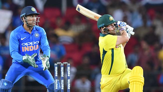 Aaron Finch hits out on his way to 37 against India.