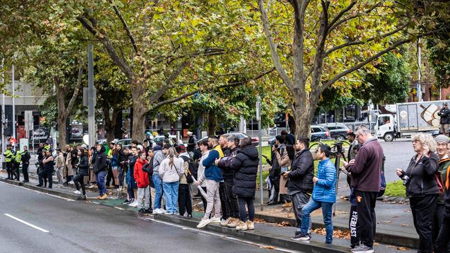 Onlookers flock to watch the spectacle. Picture: Jake Nowakowski