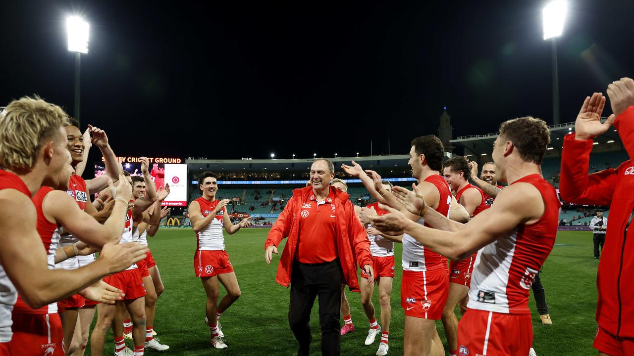Swans coach John Longmire reluctantly accepted a guard of honour of sorts in his milestone match but refused to be chaired from the ground. Photo by Phil Hillyard