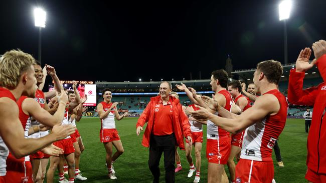 Swans coach John Longmire reluctantly accepted a guard of honour of sorts in his milestone match but refused to be chaired from the ground. Photo by Phil Hillyard