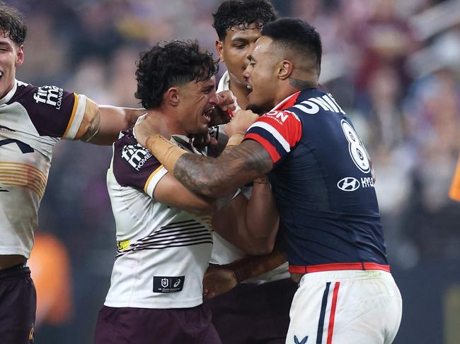 LAS VEGAS, NEVADA - MARCH 02: SpencerÂ Leniu (r) of the Roosters exchanges heated words with KotoniÂ Staggs of the Broncos during the round one NRL match between Sydney Roosters and Brisbane Broncos at Allegiant Stadium, on March 02, 2024, in Las Vegas, Nevada.   Ezra Shaw/Getty Images/AFP (Photo by EZRA SHAW / GETTY IMAGES NORTH AMERICA / Getty Images via AFP)