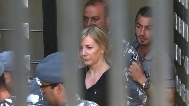 Sally Faulkner is taken to a prison van. Picture: Liam Kidston.