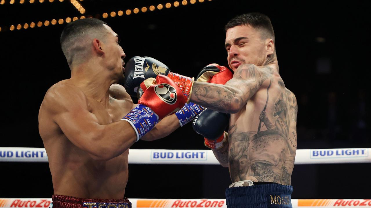 Teofimo Lopez punches George Kambosos during their championship bout in November.