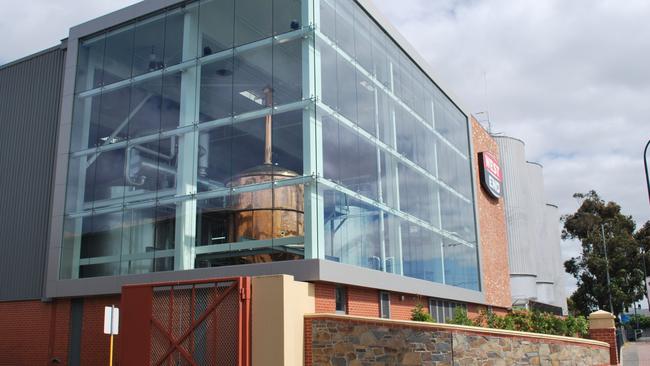 The historic copper kettle is visible in the glass-fronted building on Port Road.