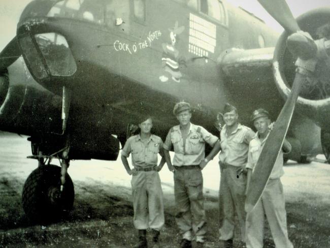 Jones and crew:  Pictured in front of the Beaufort Bomber 'Cock o' The North' are Ray Barber, David Jones, Allan Davies and Shelton Palframan. The photo was taken in New Guinea in 1945. Picture: Private collection of Flight Lieutenant David Jones