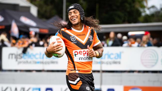 Jarome Luai warms up before he takes on the Cronulla Sharks at Leichhardt Oval. Photo: Tom Parrish