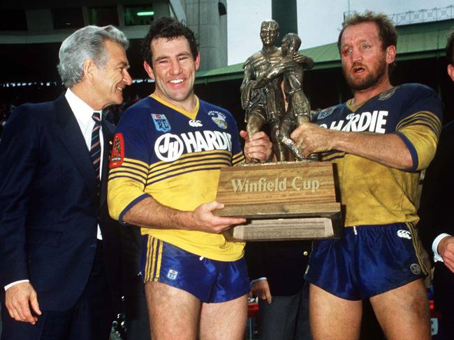 Not even Eels legend Michael Cronin (centre) could bring Parramatta a premiership as coach.