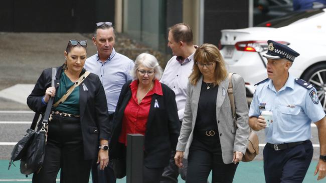 Family and supporters arrive of Constable Masters, including his widow Sharon, have attended the hearing. Picture: NewsWire/Tertius Pickard