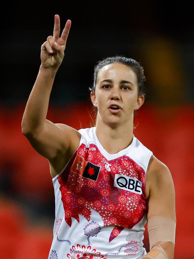 Sydney star Chloe Molloy celebrates her goal with Suns fans. Picture: Dylan Burns/AFL Photos