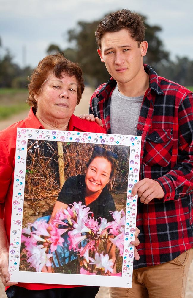 Lee Little and Alicia’s son, Ariki, with a photo of Alicia last year. Picture: Mark Stewart.-