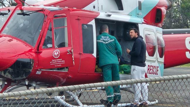 Gold Coast sailor Xavier Doerr with the rescue helicopter in Port Lincoln. Picture: NINE NEWS