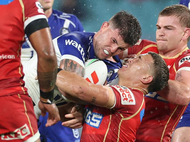 SYDNEY, AUSTRALIA - MAY 22: Toby Sexton of the Bulldogs collides with Kurt Donoghoe of the Dolphins during the round 12 NRL match between Canterbury Bulldogs and Dolphins at Accor Stadium on May 22, 2025, in Sydney, Australia. (Photo by Cameron Spencer/Getty Images)