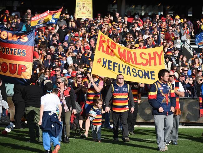 Crows and Port fans flood Adelaide Oval in tribute to the late Phil Walsh. Picture: Naomi Jellicoe