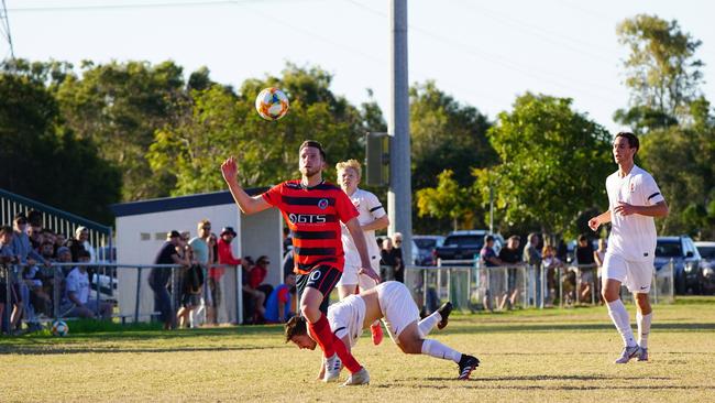 Nerang Eagles number 10, Luke Marsh, juggles his way through a scrambling Bureligh Heads defense and his pivotal performance to bag a goal and assist in the Eagle 4-1 thumping of the defending champions at Nerang on Sunday. Photo: Luke Sorensen.