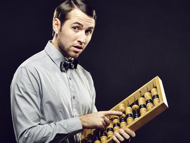 Vintage business man counting with abacus