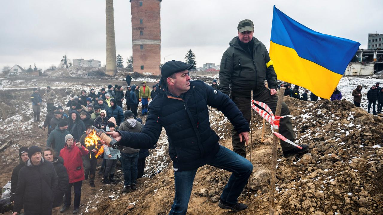 Civilians train to throw Molotov cocktails to defend the city, as Russia's invasion of Ukraine continues, in Zhytomyr, Ukraine. Picture: Reuters