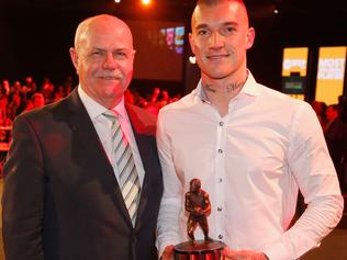 MELBOURNE, AUSTRALIA - SEPTEMBER 12:  Dustin Martin of the Tigers poses for a photo with Leigh Matthews after winning the AFL Players' MVP Awards at Shed 14 Central Pier on September 12, 2017 in Melbourne, Australia.  (Photo by Darrian Traynor/Getty Images)