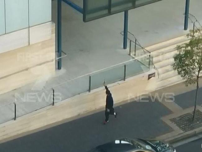 Channel 7 video frame grabs of the moment Parramatta shooter 15-year-old Farhad Khalil Mohammad Jabar started firing a gun in front of Parramatta police station killing NSW police worker Curtis Cheng, before being shot dead.