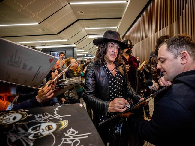 Paul Stanley signs autographs for fans upon arrival at Melbourne Airport to begin the Australian leg of the End of the Road Tour. Picture: Jake Nowakowski