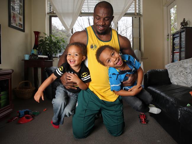 Simplice Ribouem with his sons Nathan, 3, and Samuel, 4.