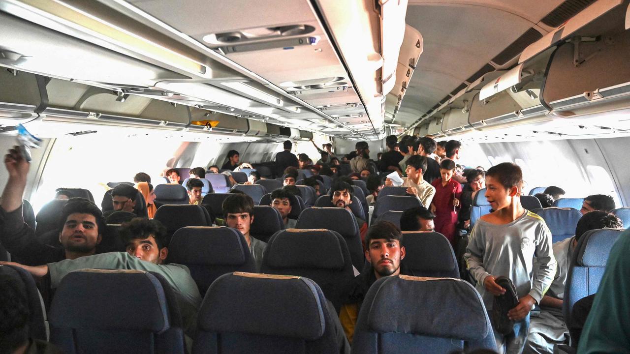 Afghan passengers wait to depart at Kabul International Airport. Picture: AFP