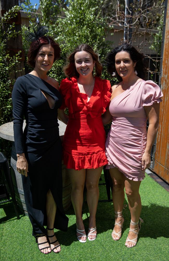 Alissa Beresford, left, with Madison Watt and Katie Kay from Huskisson at Flamin Galah Brewery in Huskisson for Melbourne Cup Day. Picture: Nathan Schmidt