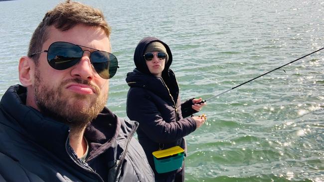 Dan Ewing fishing with his partner Kat Risteska.