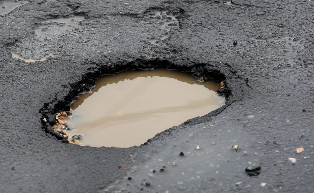 Riddled with potholes | Daily Telegraph