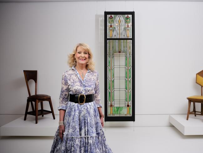 Portrait of Krystyna Campbell-Pretty AM with Marion Mahony’s Window from the Unitarian Church of All Souls, Evanston, Illinois 1902.Picture: Eugene Hyland