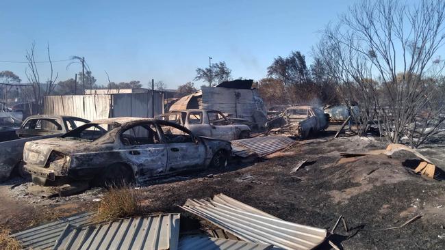 A bushfire, believed to be deliberately lit, ripped through a residential area by the airport and destroyed multiple homes. Picture: Facebook / Action For Alice 2020