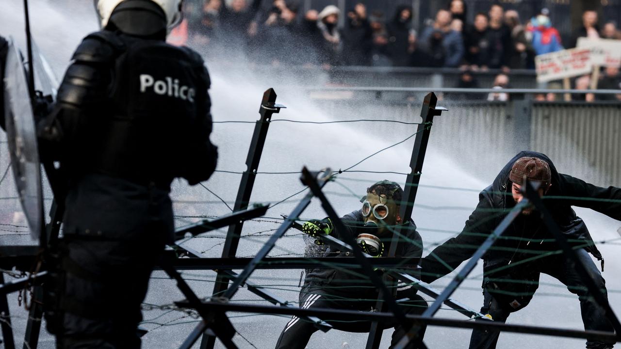 Police use water canon to disperse demonstrators in Brussels on November 21. Picture: Kenzo Tribouillard/AFP