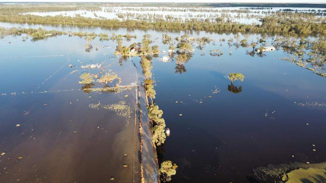 The levy has broken and they are calling for help to save their home from flooding. Picture: Dee Ringrose