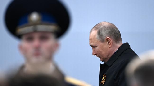 Russian President Vladimir Putin arrives to watch the Victory Day military parade at Red Square in central Moscow.