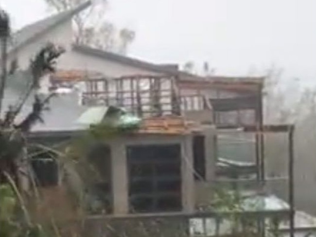 Kim Cowley shared this photo of the "roof half off" their house on Hamilton Island.