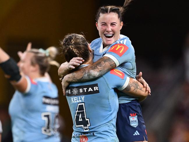 Fressard and Isabelle Kelly celebrate victory in Game 1 of the series. Picture: Hannah Peters/Getty Images