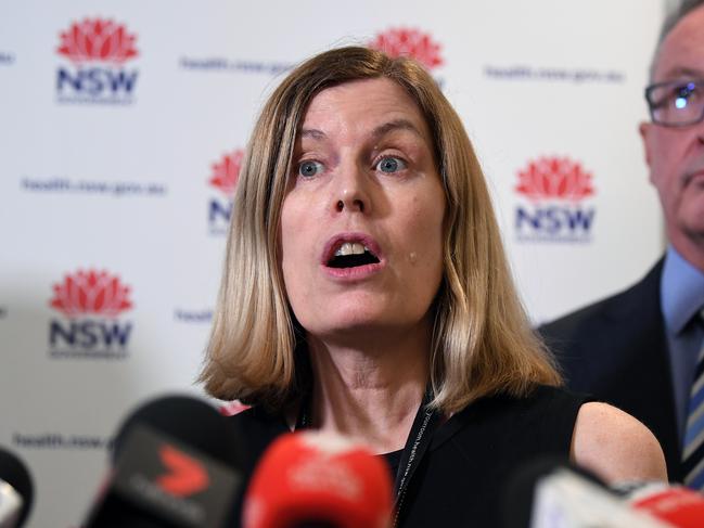 NSW Health Minister Brad Hazzard (right) and NSW Chief Health Officer Dr Kerry Chant speak to the media at the NSW Ministry of Health in Sydney, Monday, January 27, 2020. NSW Health on Monday afternoon confirmed a 21-year-old woman who was on the last flight out of Wuhan to arrive in Sydney has tested positive to coronavirus. (AAP Image/Joel Carrett) NO ARCHIVING